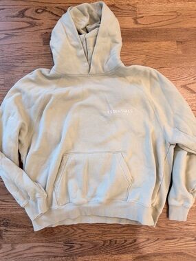 Large Fear of God ESSENTIALS Hoodie in Light Green